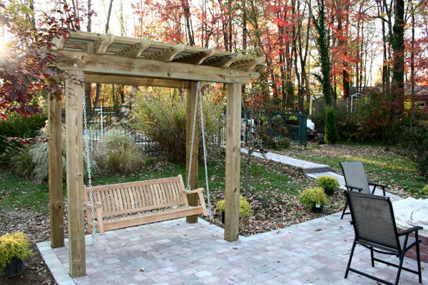 custom patio, a swing pergola, a flower planter, work bench, custom 